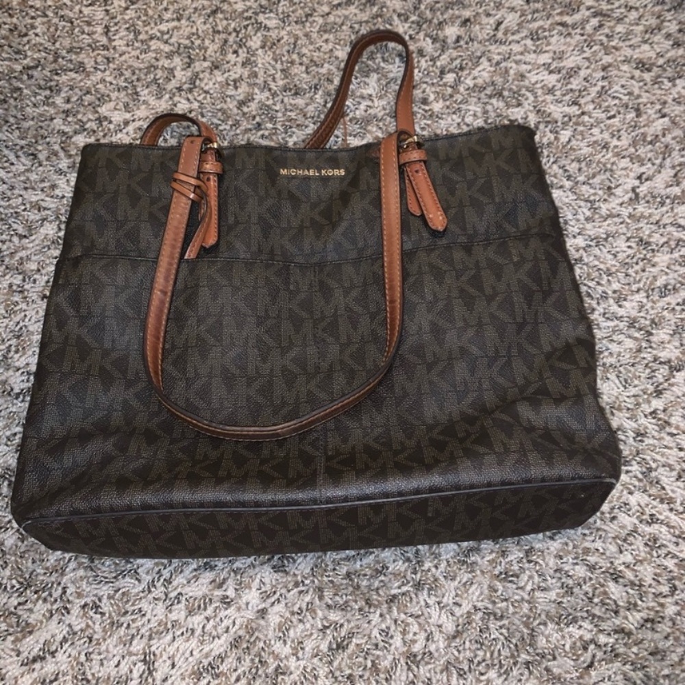 Brown Michael Kors purse and wallet